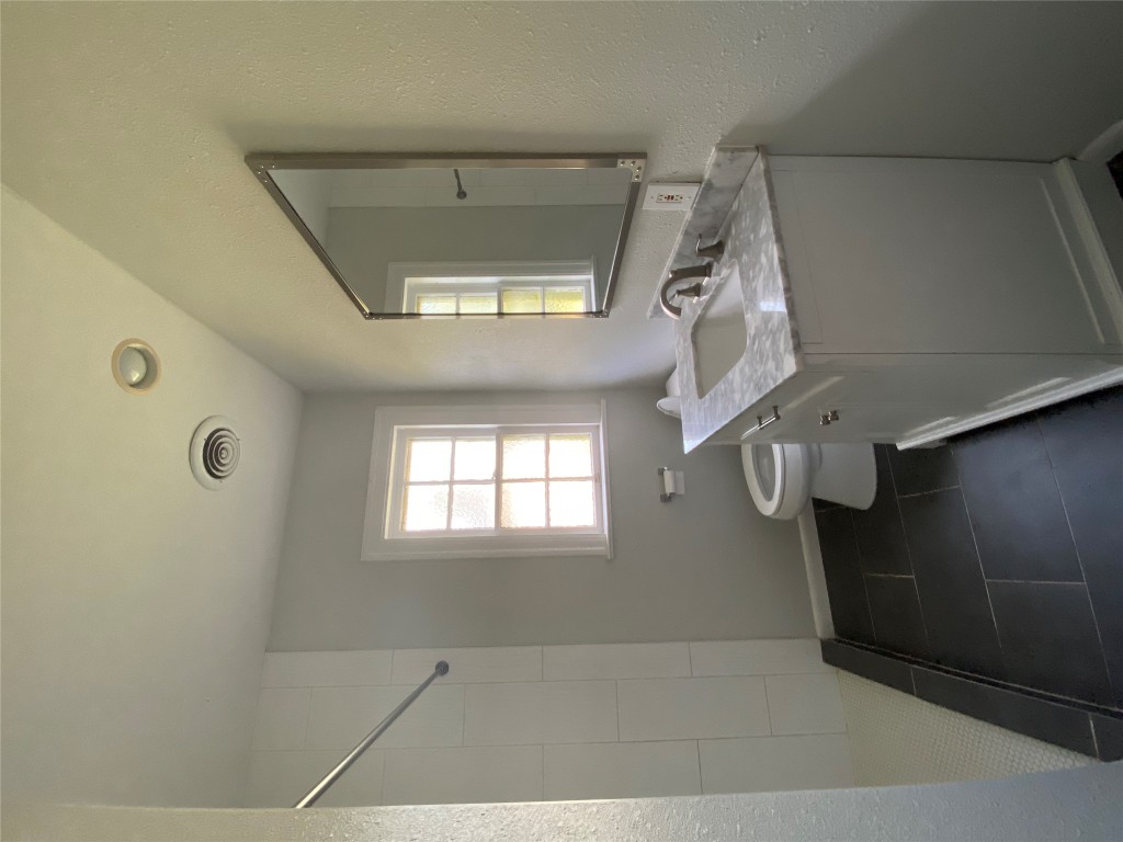 3804 Duval Street Austin, TX 78751 - Photo 18 of 21 a bathroom with a sink and a toilet