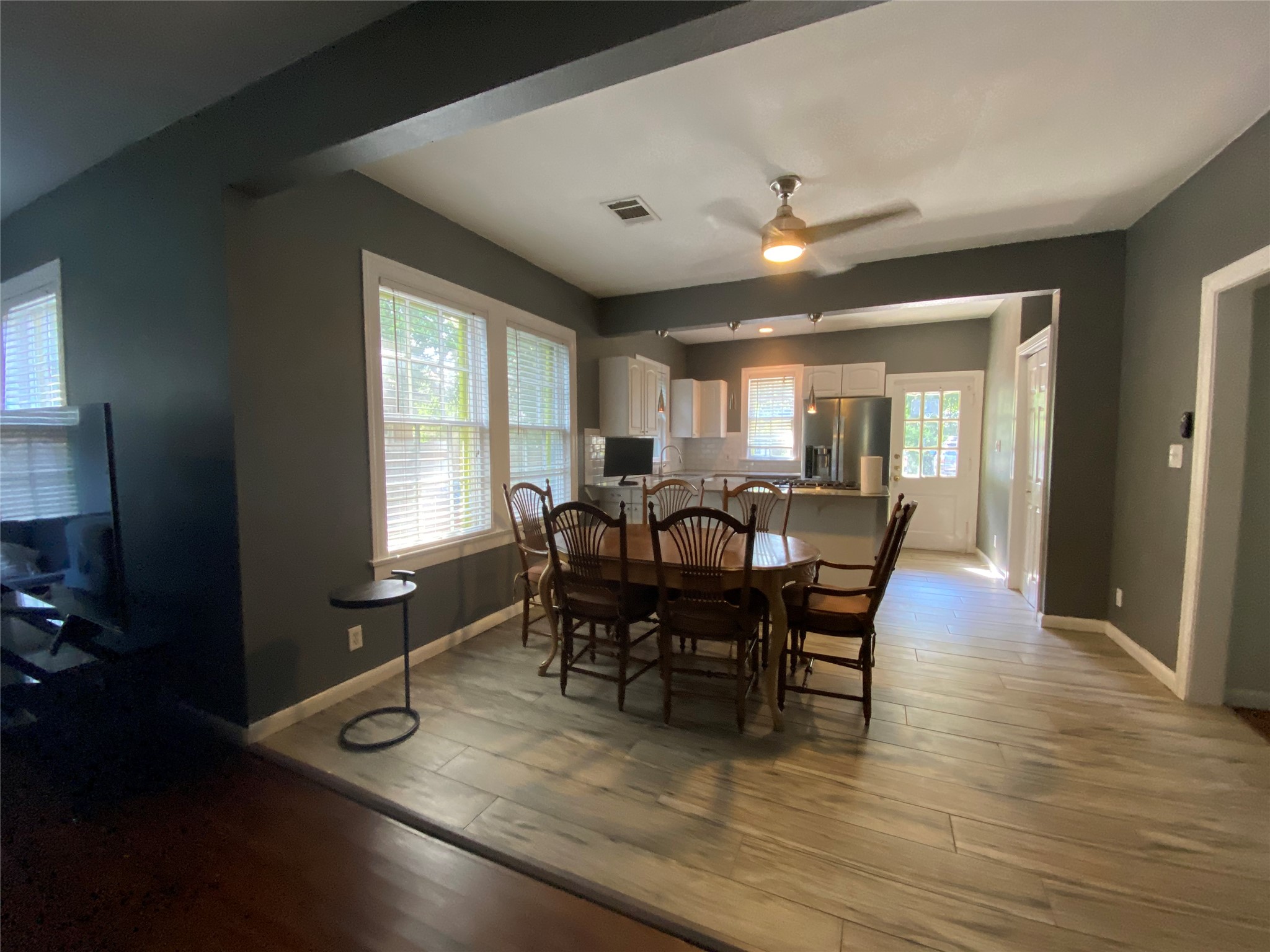 3804 Duval Street Austin, TX 78751 - Photo 2 of 21 a view of a dining room with furniture and wooden floor