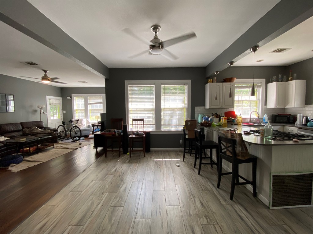 3804 Duval Street Austin, TX 78751 - Photo 8 of 21 a living room with furniture and a wooden floor