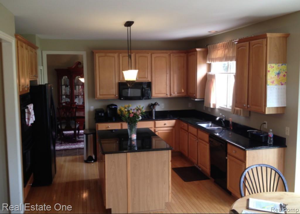 48005 Gladstone Road Canton, MI 48188 - Photo 12 of 62 Spacious, beautifully appointed kitchen wonderful for entertaining
