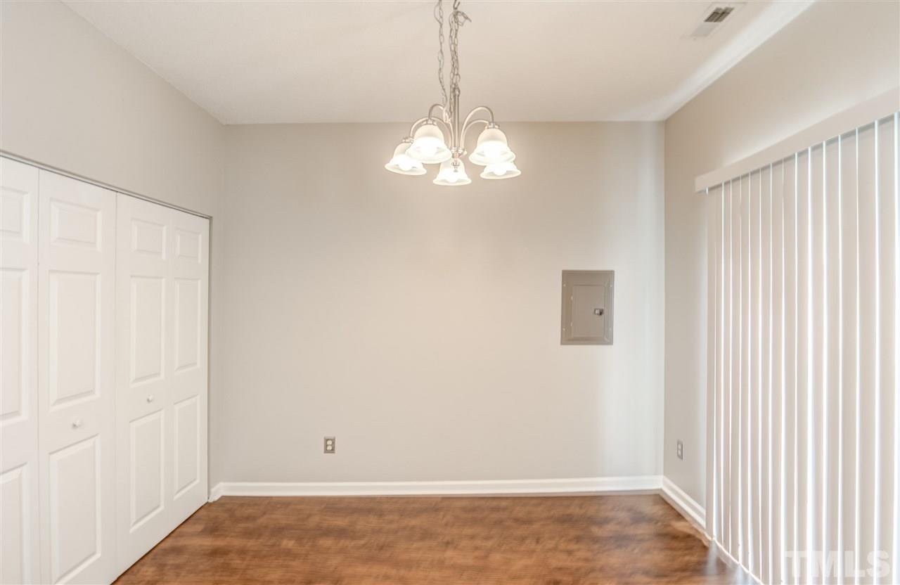 105 Watertree Lane Apex, NC 27502 - Photo 16 of 30 a view of a chandelier in a room