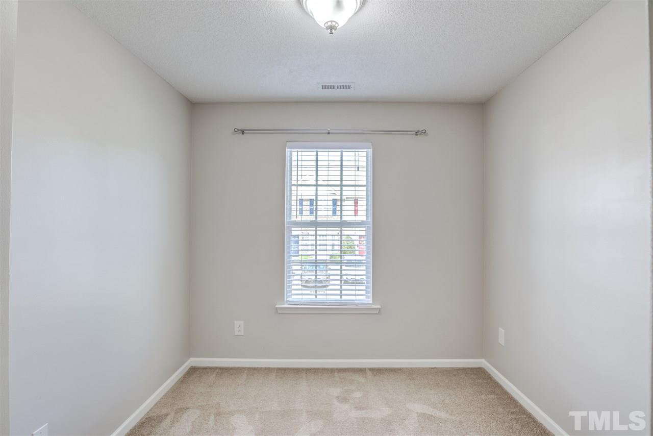 105 Watertree Lane Apex, NC 27502 - Photo 24 of 30 an empty room with a window