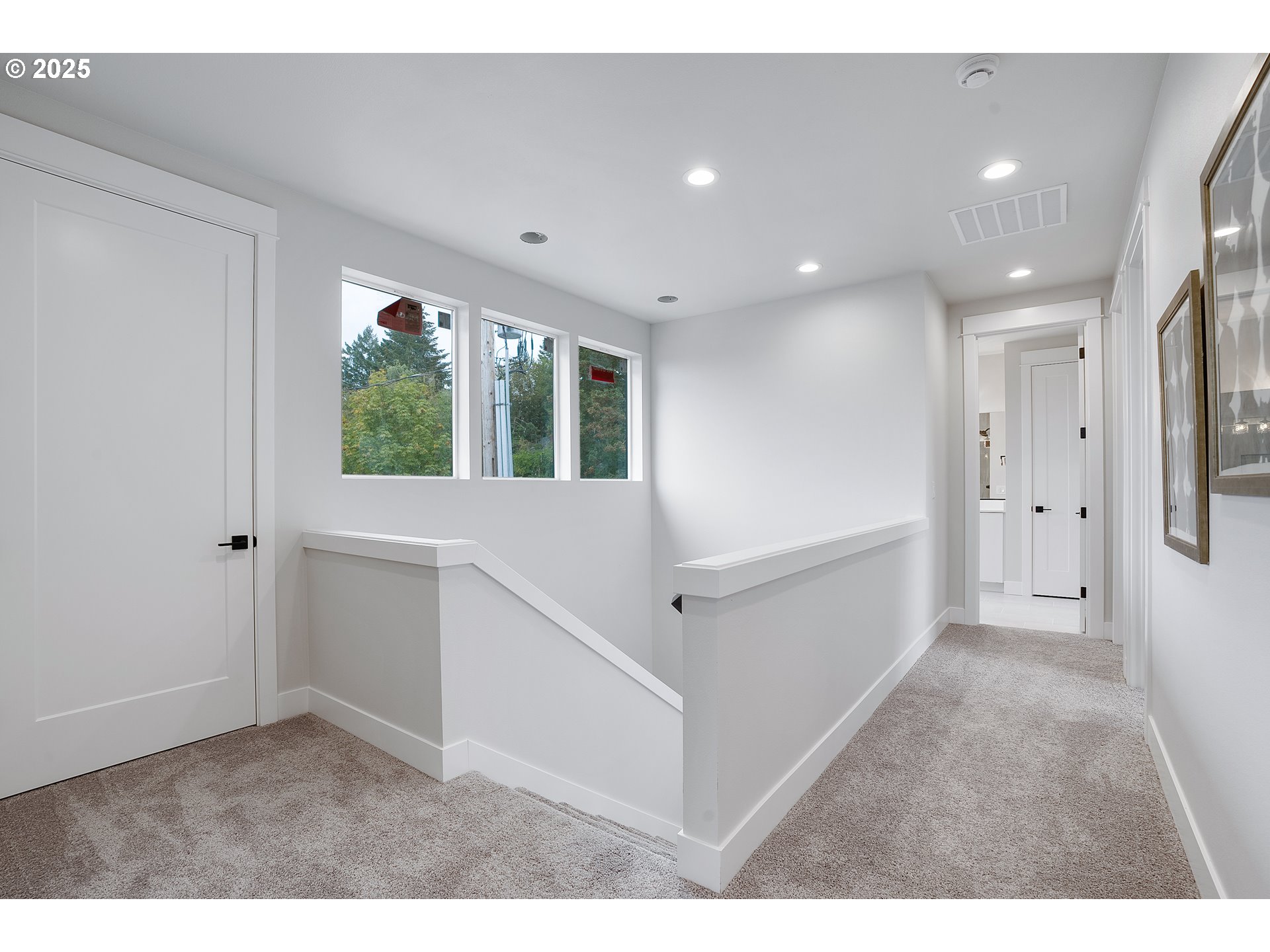 6024 Southwest 18th Drive Portland, OR 97239 - Photo 25 of 46 a view of an entryway with wooden floor