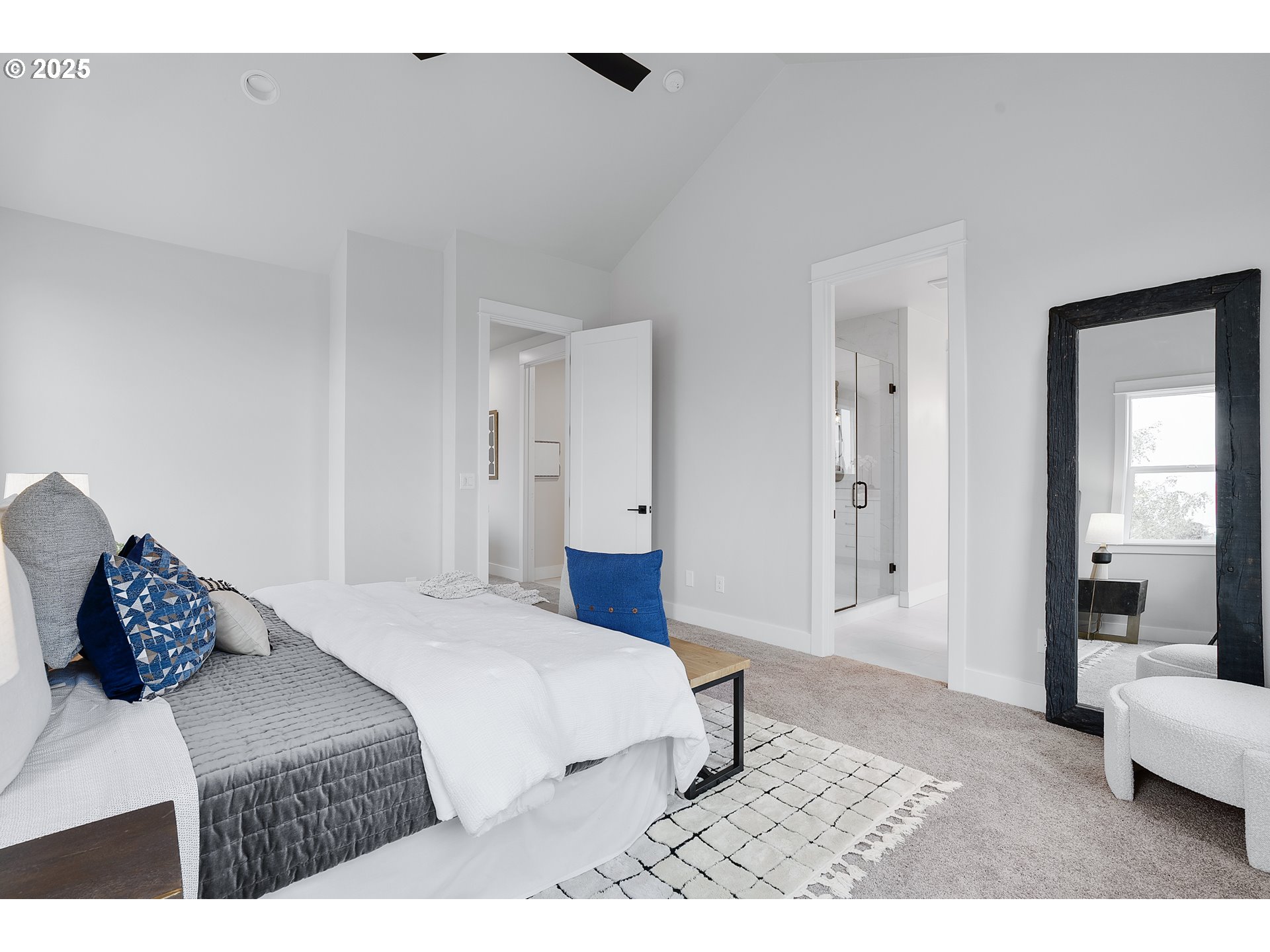 6024 Southwest 18th Drive Portland, OR 97239 - Photo 30 of 46 a bedroom with a bed and a couch