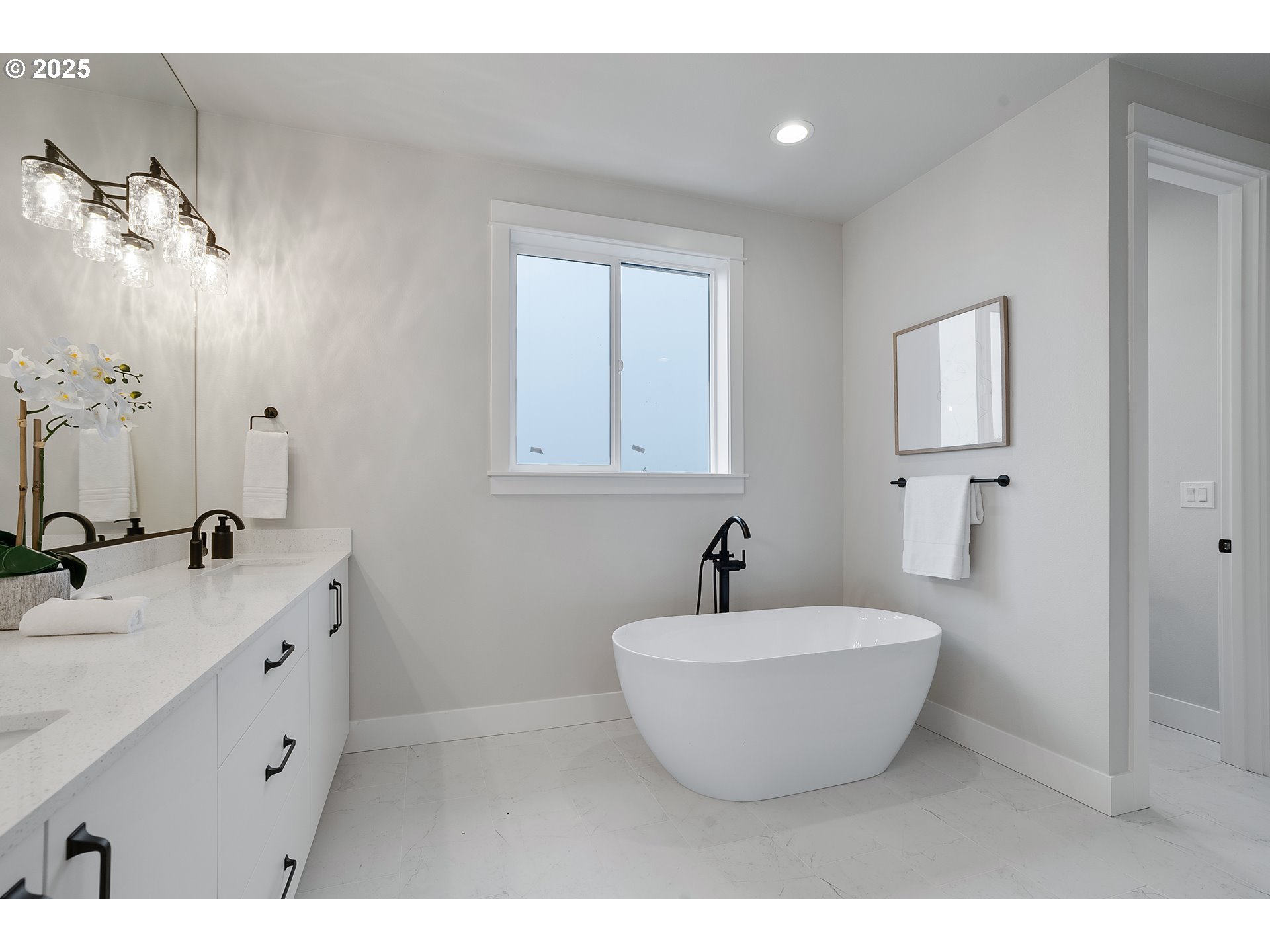 6024 Southwest 18th Drive Portland, OR 97239 - Photo 34 of 46 a bathroom with a sink and a mirror