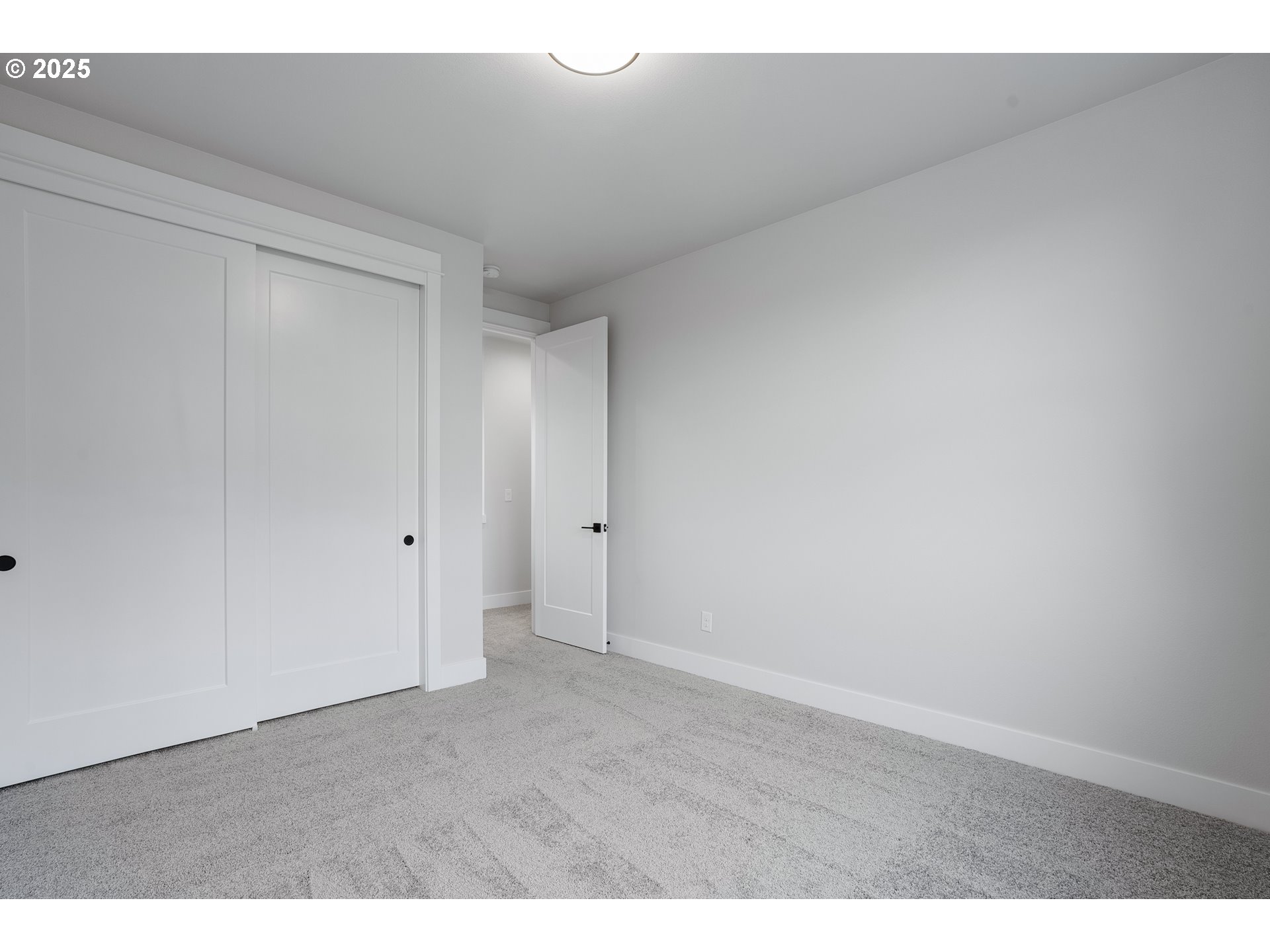 6024 Southwest 18th Drive Portland, OR 97239 - Photo 37 of 46 a view of an empty room