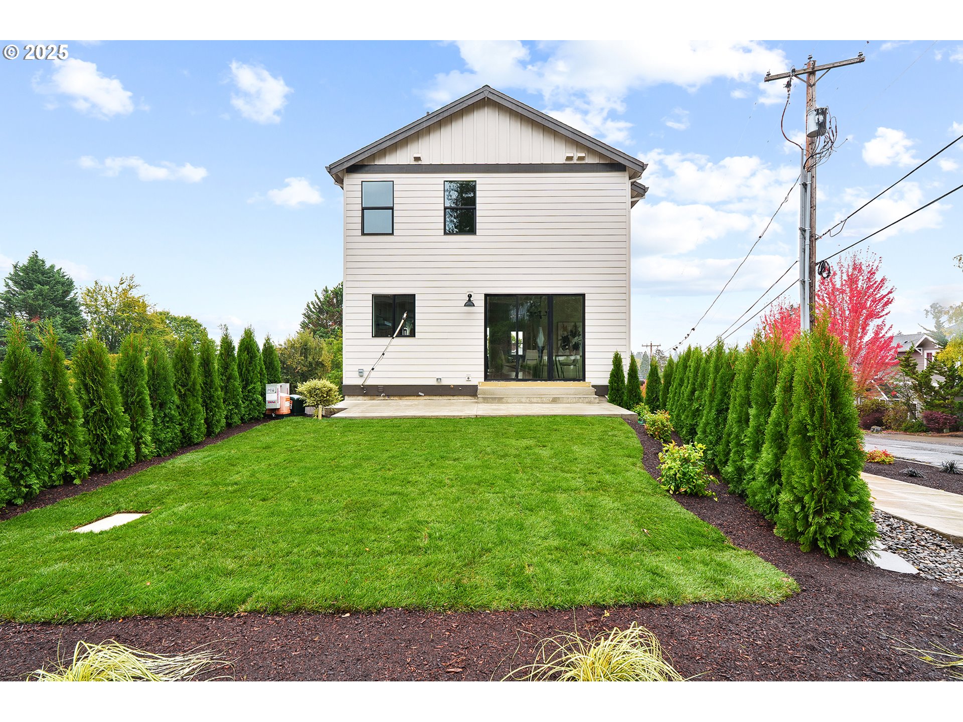 6024 Southwest 18th Drive Portland, OR 97239 - Photo 44 of 46 a view of a house with a yard
