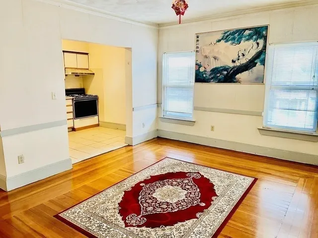 a view of a living room and bathroom