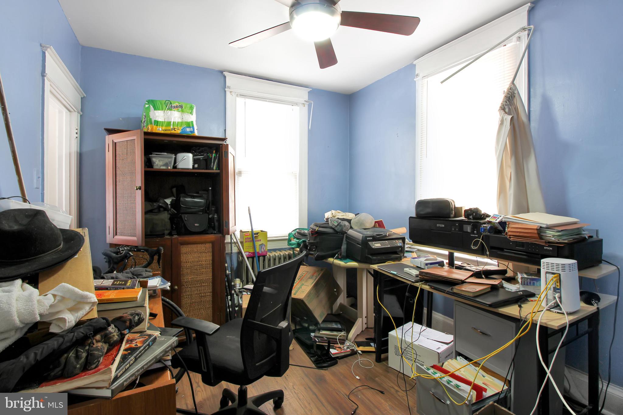 4380 Benning Road Northeast Washington, DC 20019 - Photo 11 of 14 a view of a workspace with furniture and a window