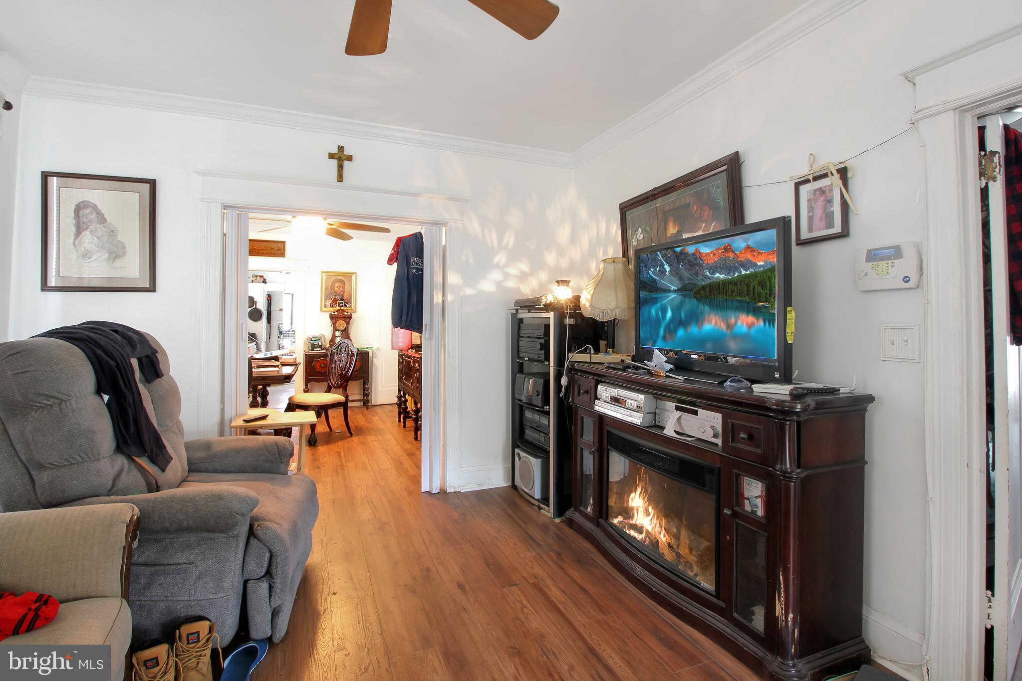 4380 Benning Road Northeast Washington, DC 20019 - Photo 7 of 14 a living room with furniture and a flat screen tv