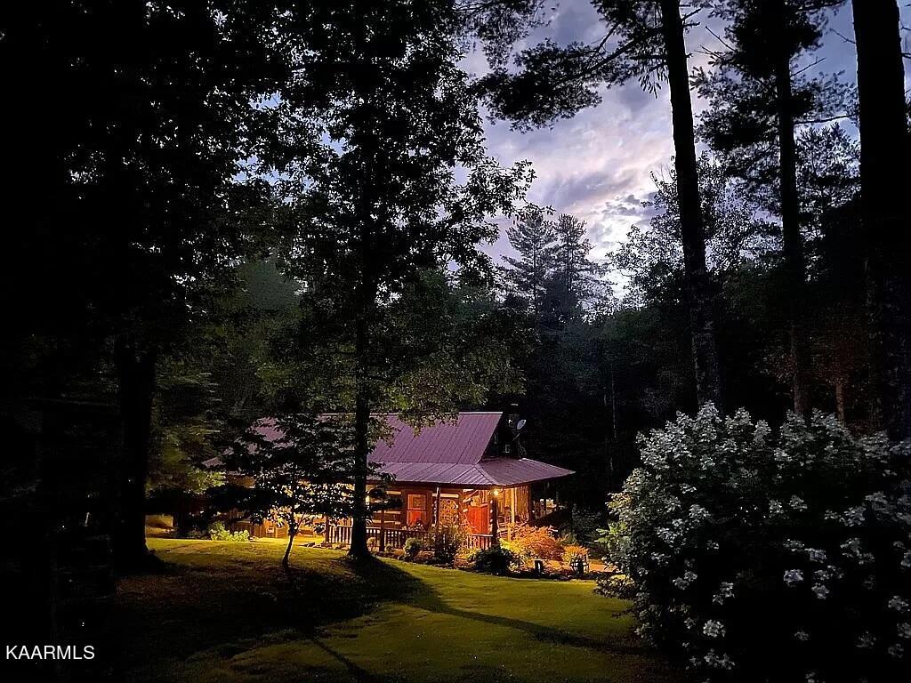 618 Coon Hollow Road Sunbright, TN 37872 - Photo 3 of 60 Main cabin at night
