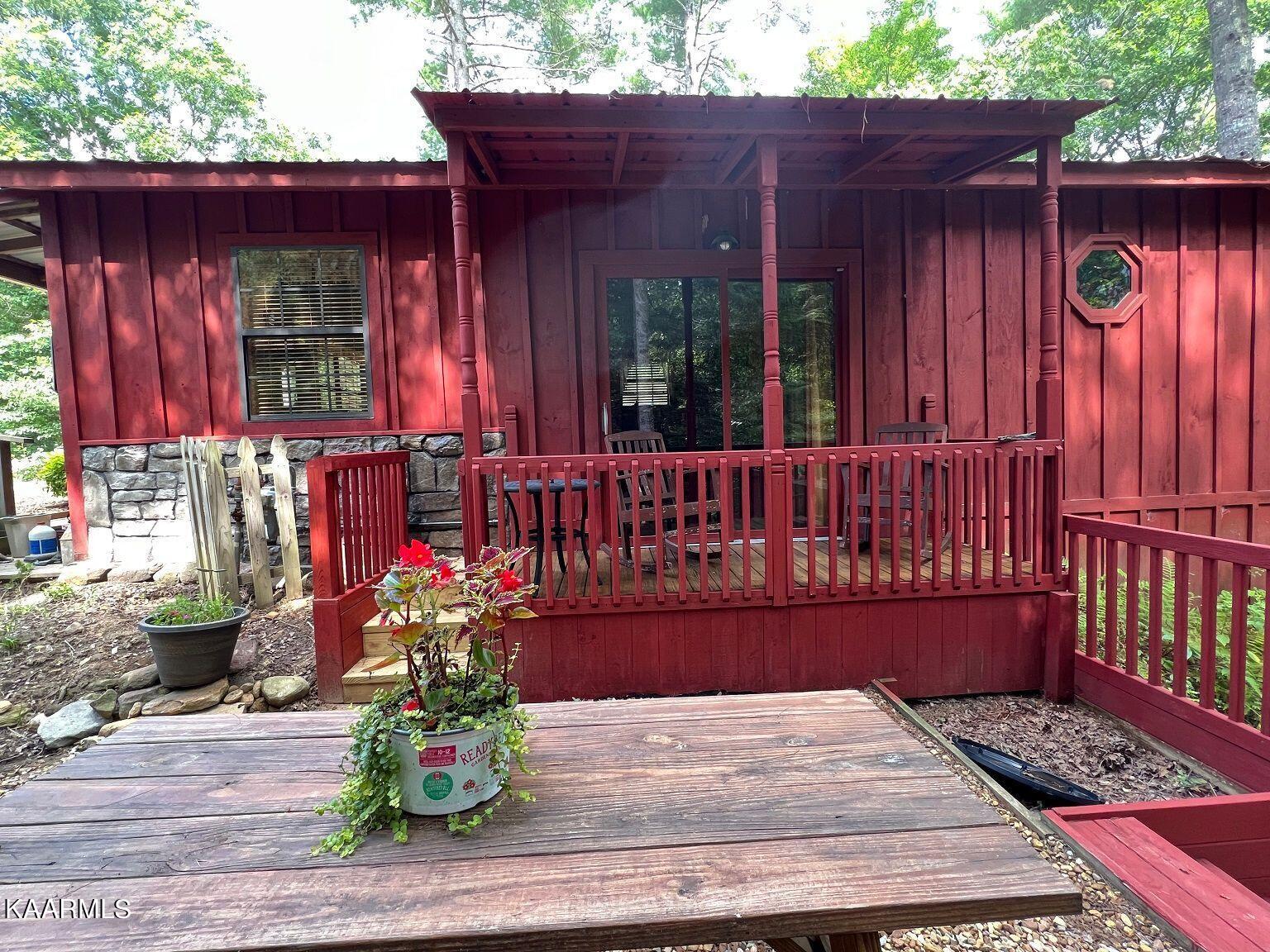 618 Coon Hollow Road Sunbright, TN 37872 - Photo 34 of 60 Cabin 3 back porch