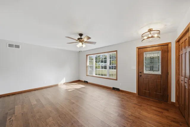 a view of livingroom and hardwood floor