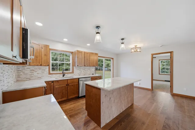 a view of kitchen and front door