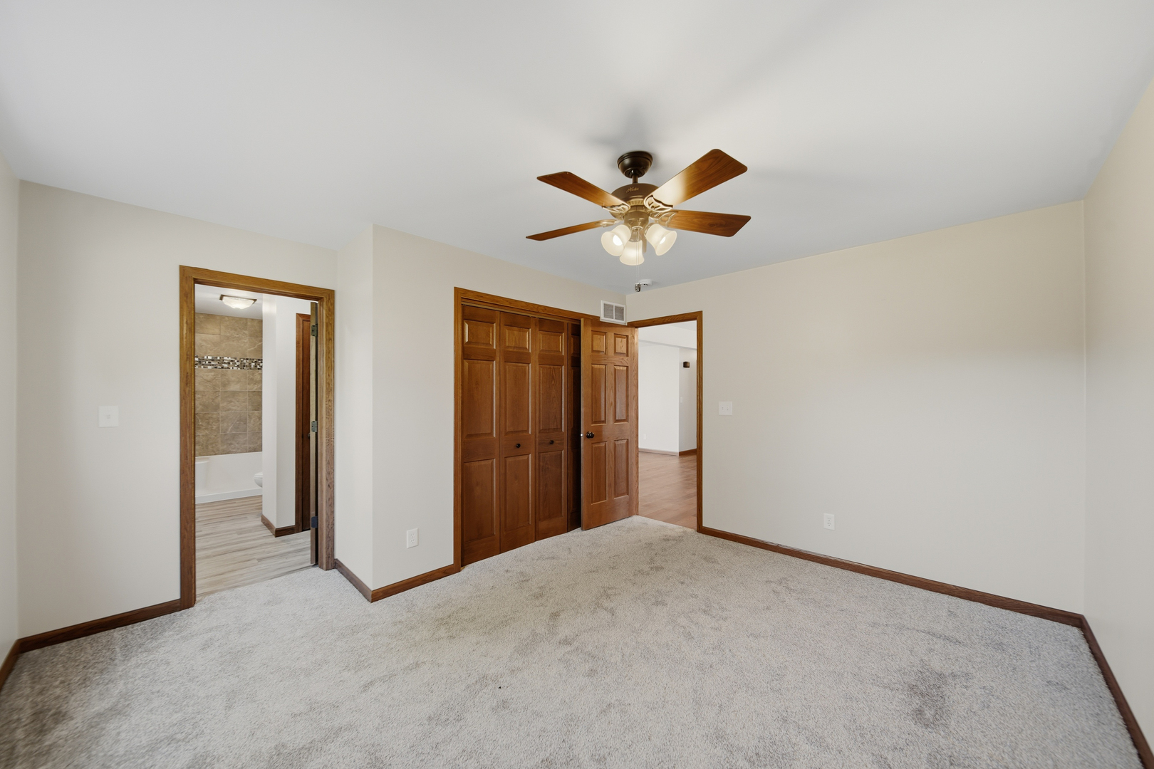 844 Hahn Avenue Dixon, IL 61021 - Photo 22 of 41 an empty room with a ceiling fan and a window