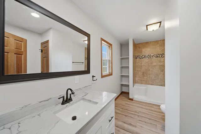 a bathroom with a bathtub