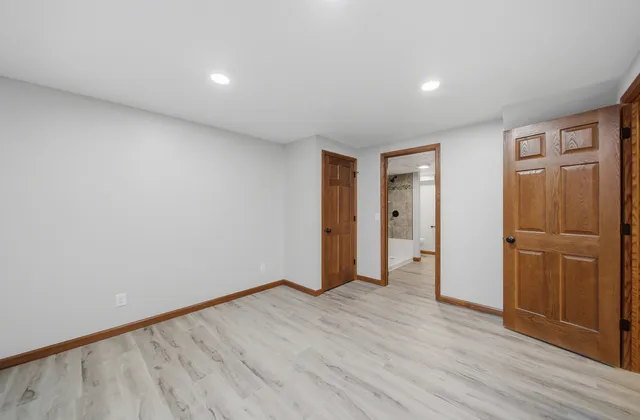 a bathroom with a bathtub and shower