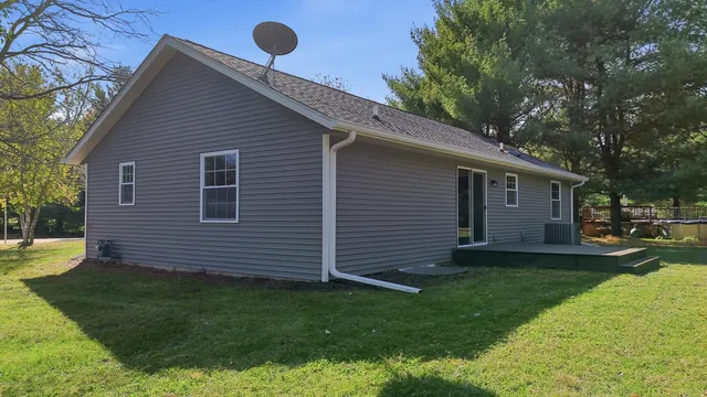 a view of a backyard with a garden