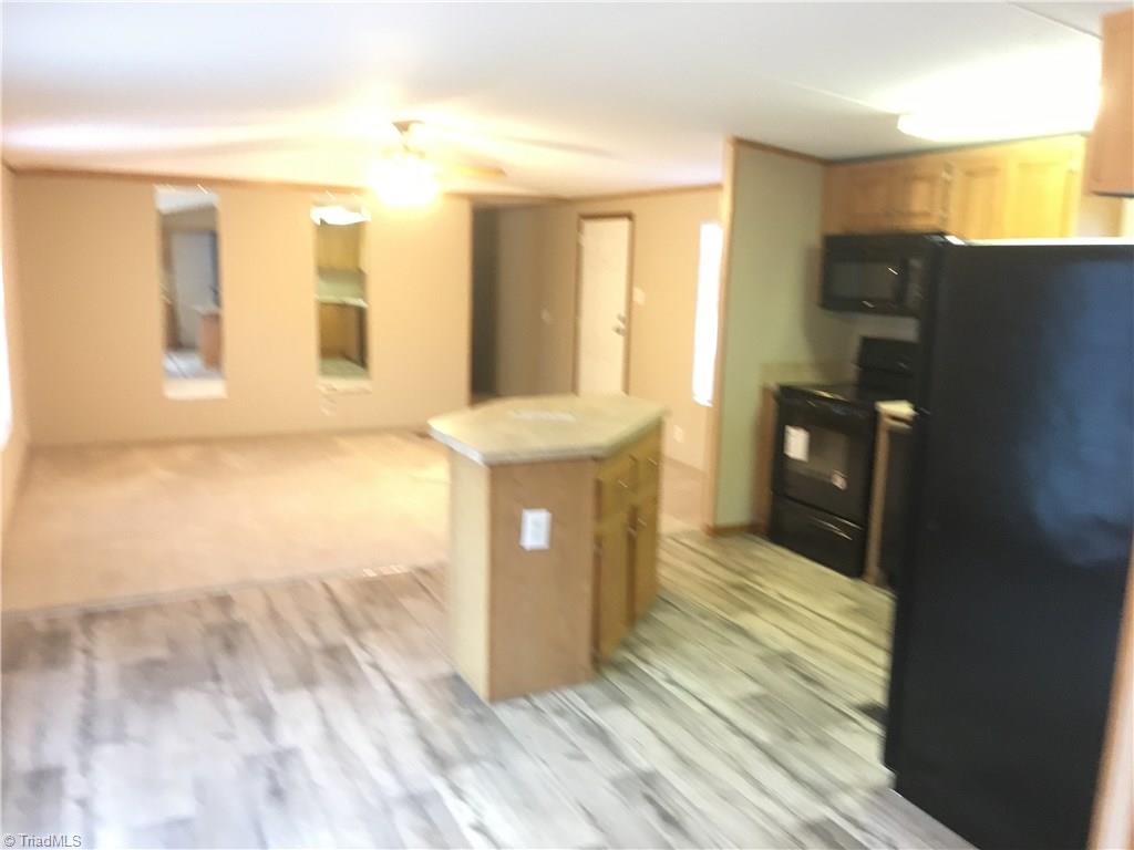321 Clyde Hayes Road Lowgap, NC 27024 - Photo 4 of 13 Gallery Image 4