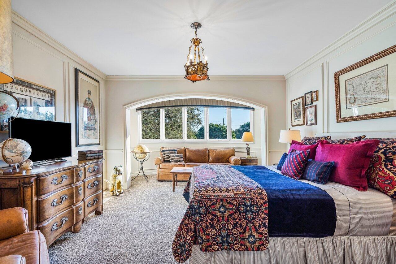 6024 Le Lac Road Boca Raton, FL 33496 - Photo 22 of 37 a bedroom with a large bed and a flat tv screen on dresser