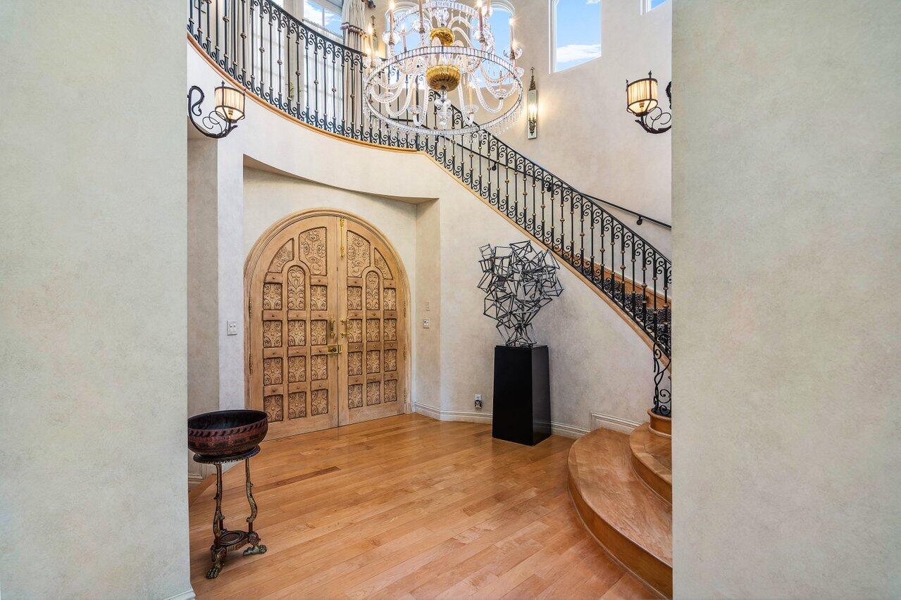 6024 Le Lac Road Boca Raton, FL 33496 - Photo 5 of 37 a view of entryway and hall with wooden floor