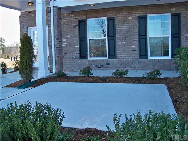 9132 Wooden Road, Unit 261 Raleigh, NC 27617 - Photo 1 of 23 Enjoy the outdoors from your front courtyard patio.