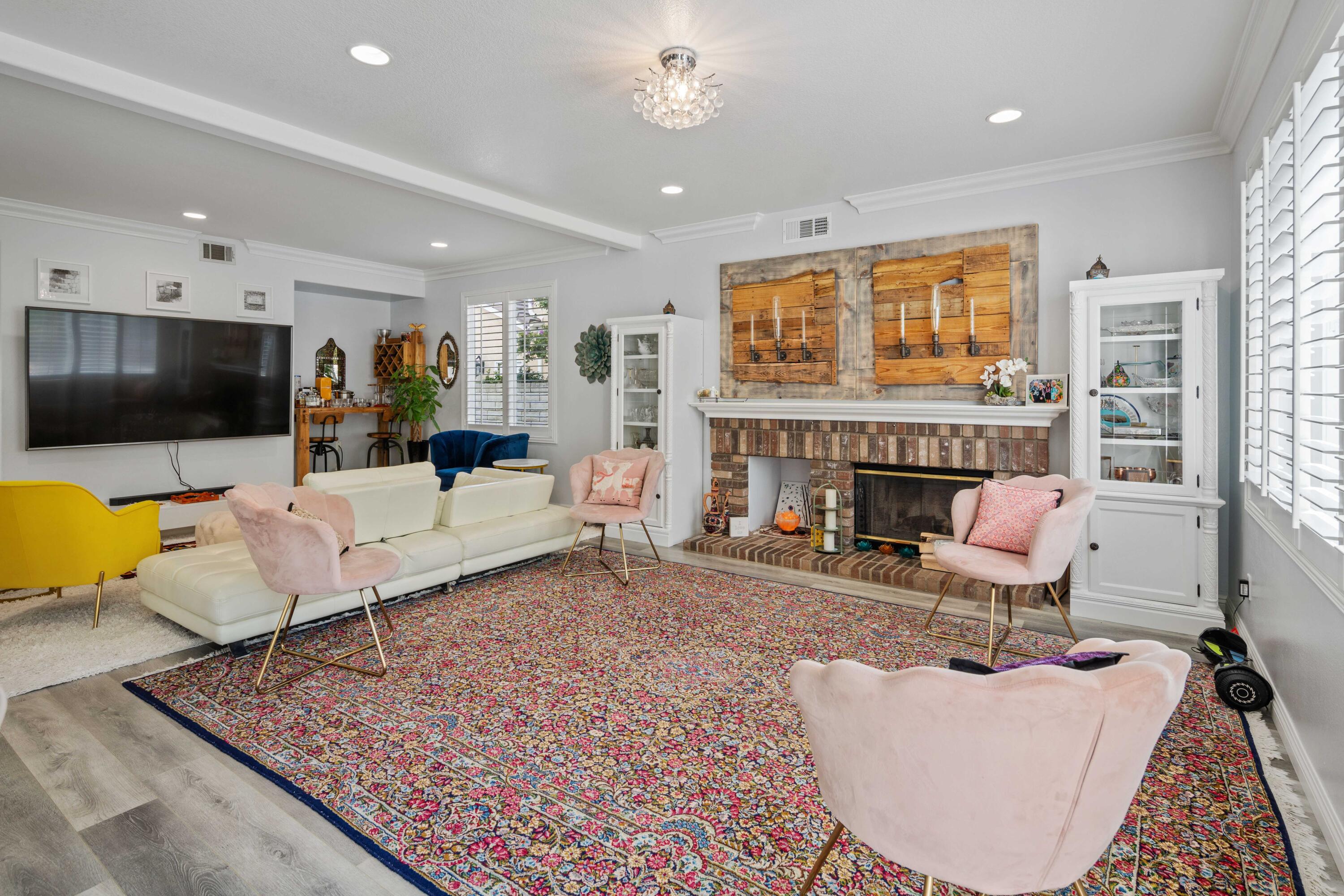 26089 Salinger Lane Stevenson Ranch, CA 91381 - Photo 13 of 47 a living room with furniture and a fireplace