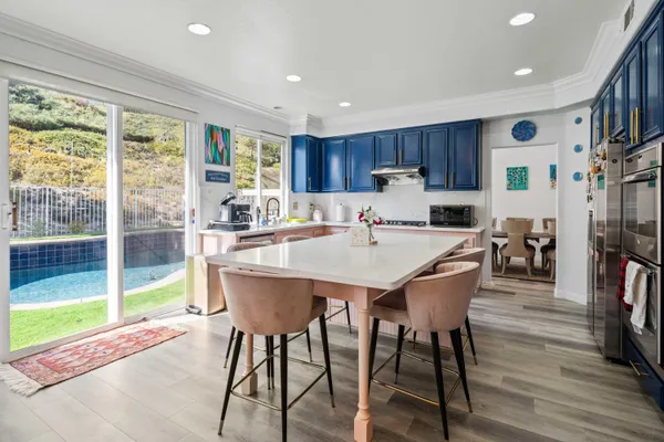 a view of yard with furniture and garden