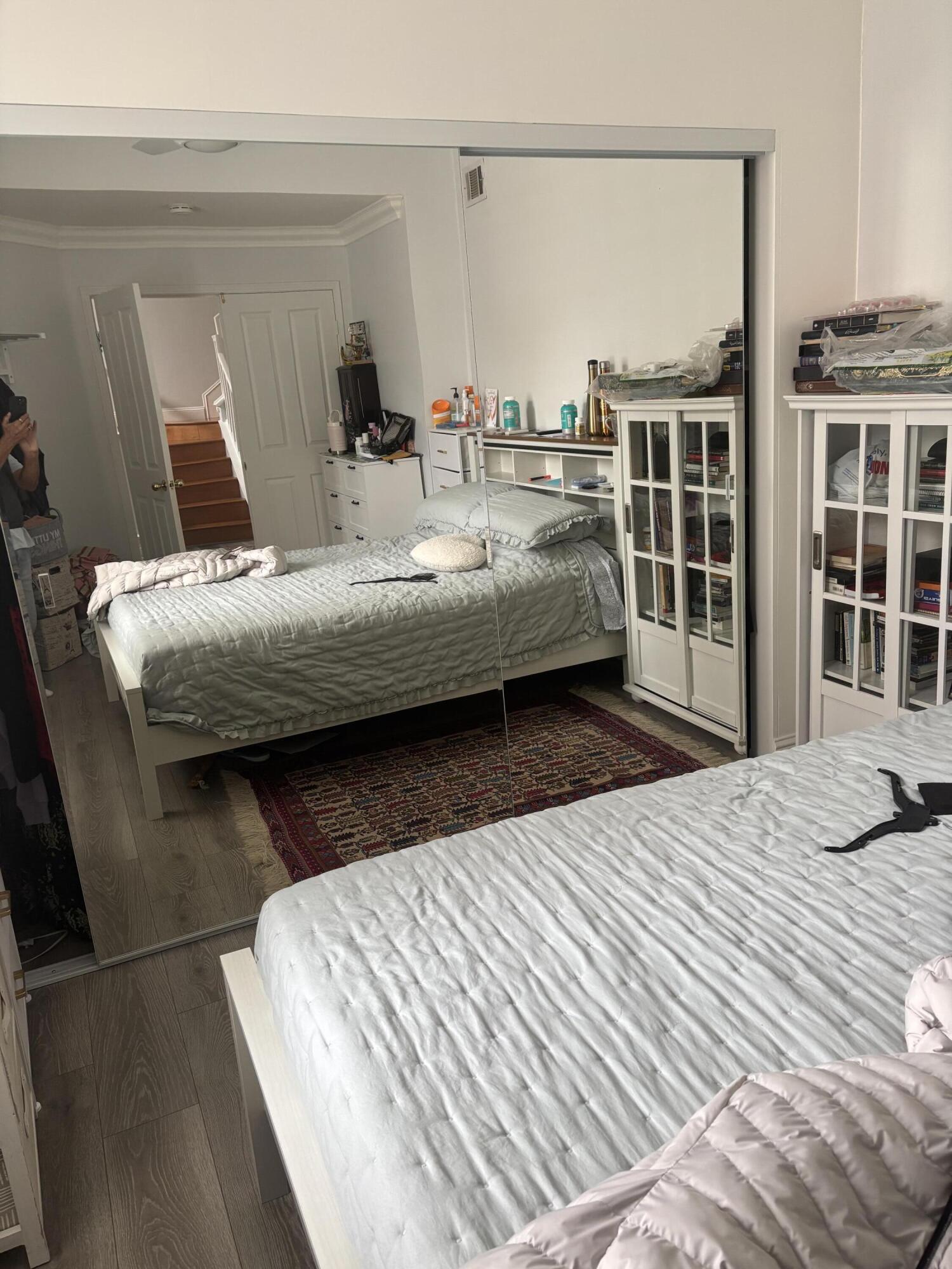 26089 Salinger Lane Stevenson Ranch, CA 91381 - Photo 34 of 47 a bedroom with a bed and wooden floor