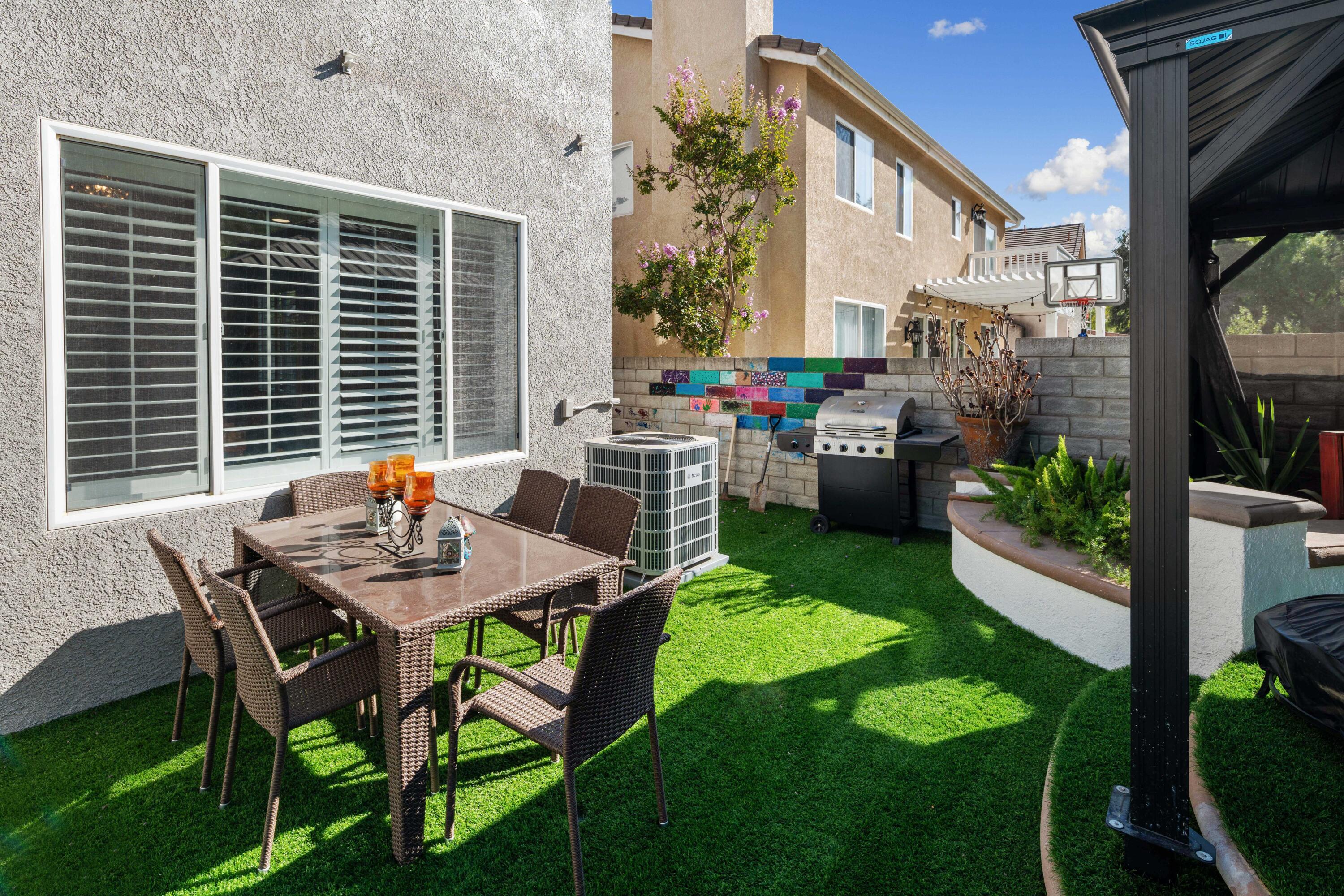 26089 Salinger Lane Stevenson Ranch, CA 91381 - Photo 47 of 47 a view of a house with backyard and sitting area