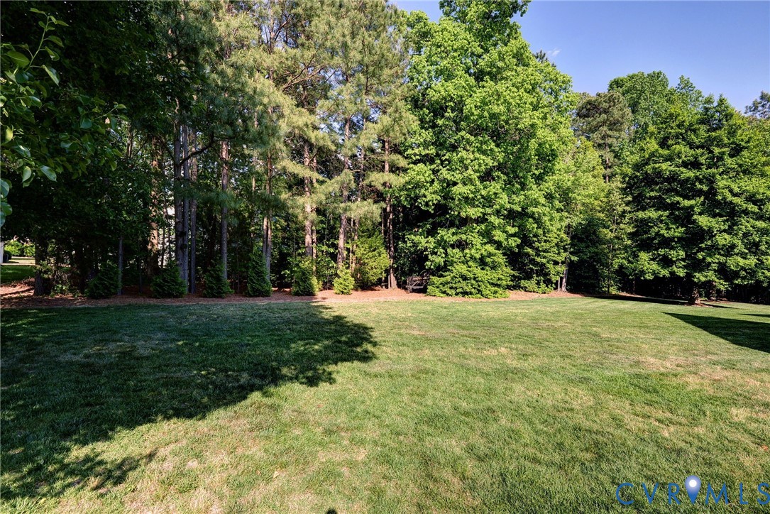 4015 Cold Spring Road Williamsburg, VA 23188 - Photo 43 of 57 Expansive rear yard featuring a manicured lawn, ma