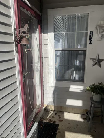 a view of entry way with wooden door