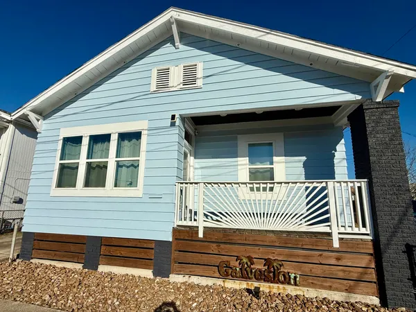 a front view of a house with a balcony