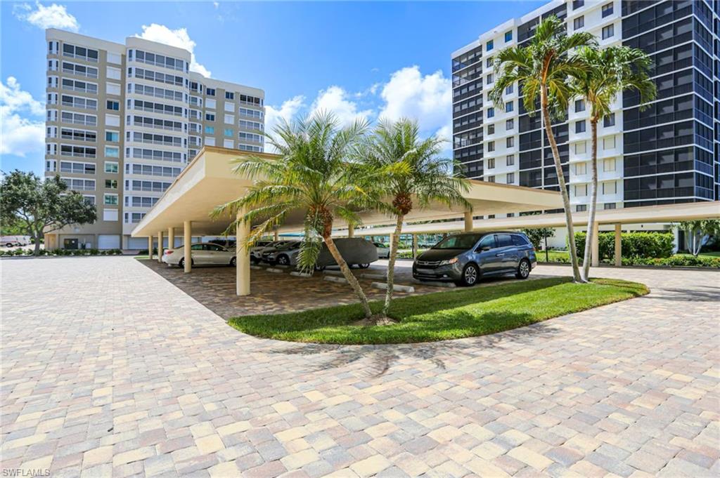 15 Bluebill Avenue, Unit 805 Naples, FL 34108 - Photo 13 of 29 a view of outdoor space yard and front view of a building