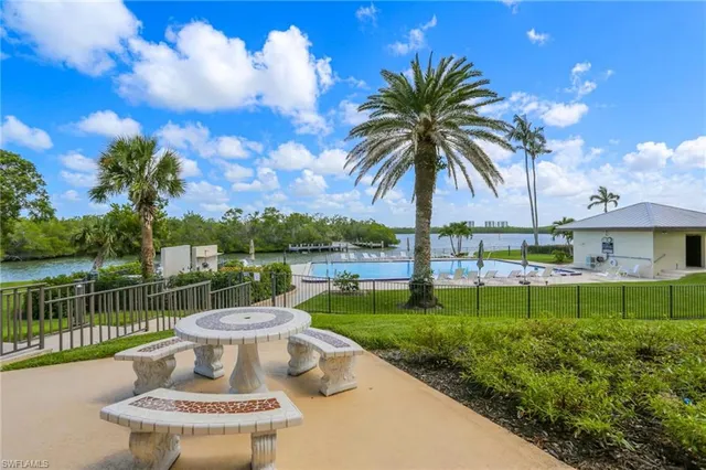 a view of a garden with a lake view