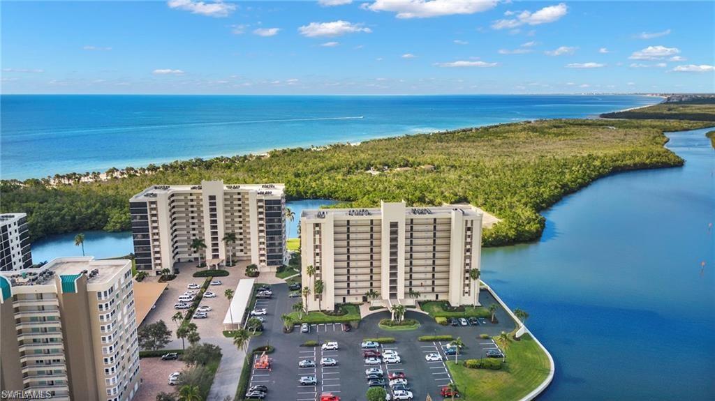 15 Bluebill Avenue, Unit 805 Naples, FL 34108 - Photo 20 of 29 a view of a city with an ocean
