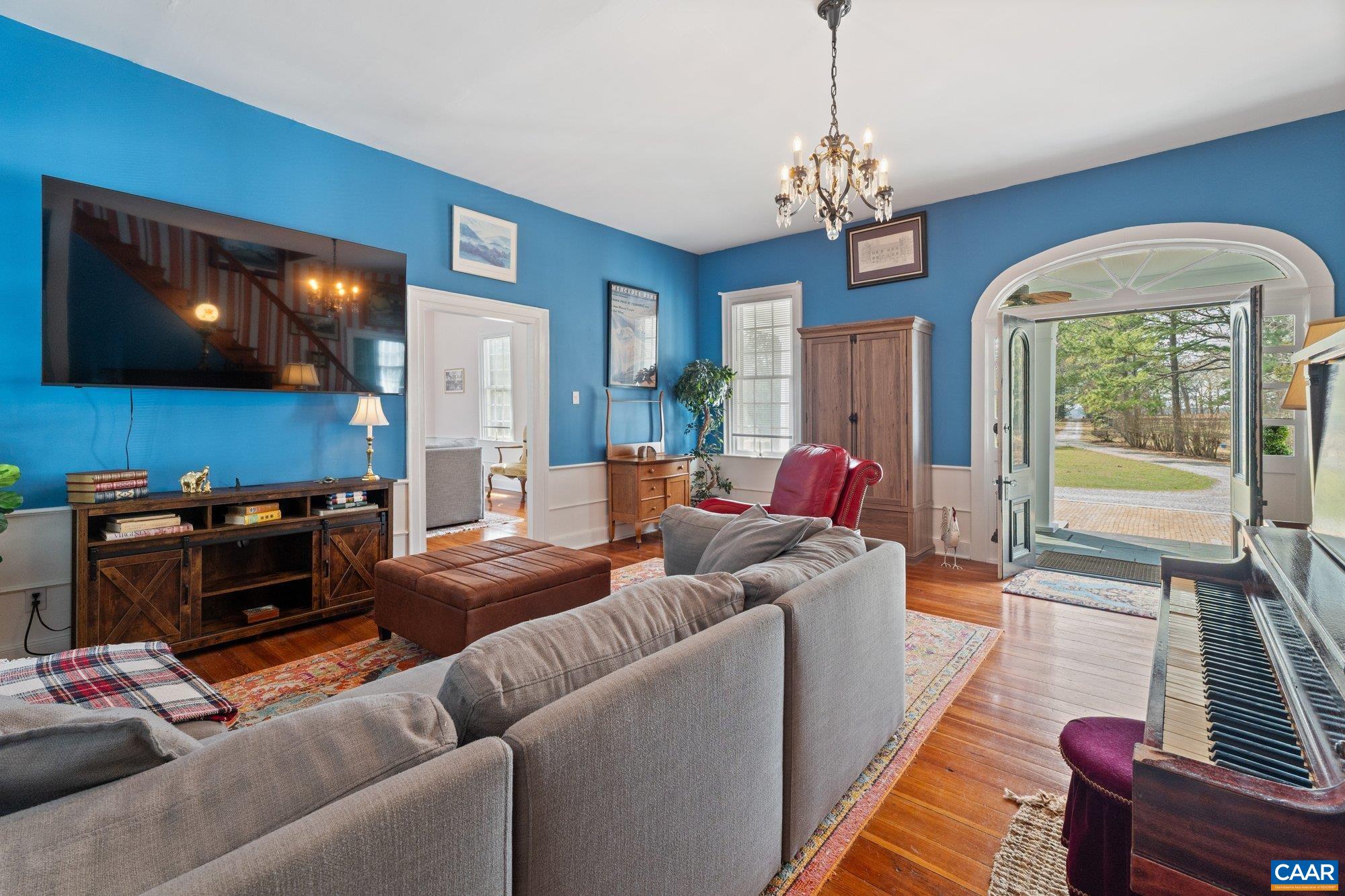 14910 Western Mill Road Lawrenceville, VA 23868 - Photo 17 of 73 a living room with furniture and a flat screen tv
