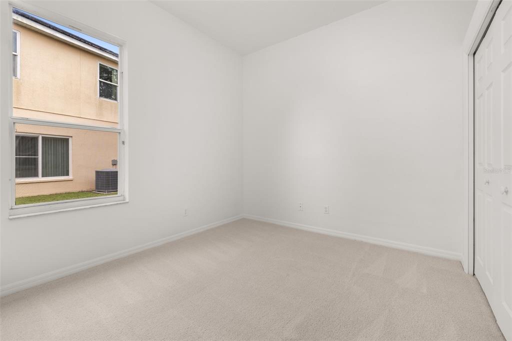 2172 The Oaks Boulevard Kissimmee, FL 34746 - Photo 26 of 81 a view of an empty room