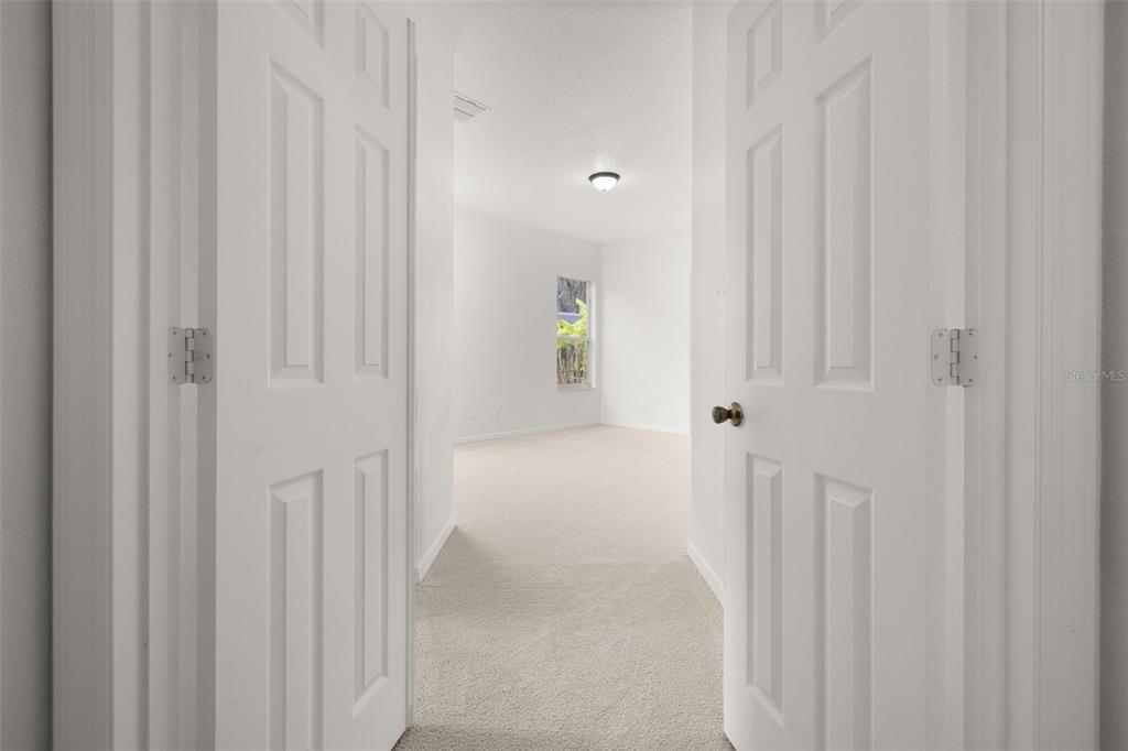 2172 The Oaks Boulevard Kissimmee, FL 34746 - Photo 33 of 81 a view of an entryway with white walls