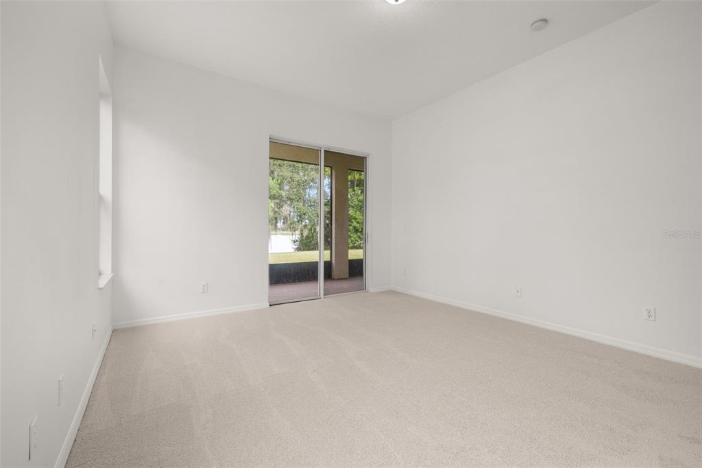 2172 The Oaks Boulevard Kissimmee, FL 34746 - Photo 35 of 81 a view of an empty room with a window