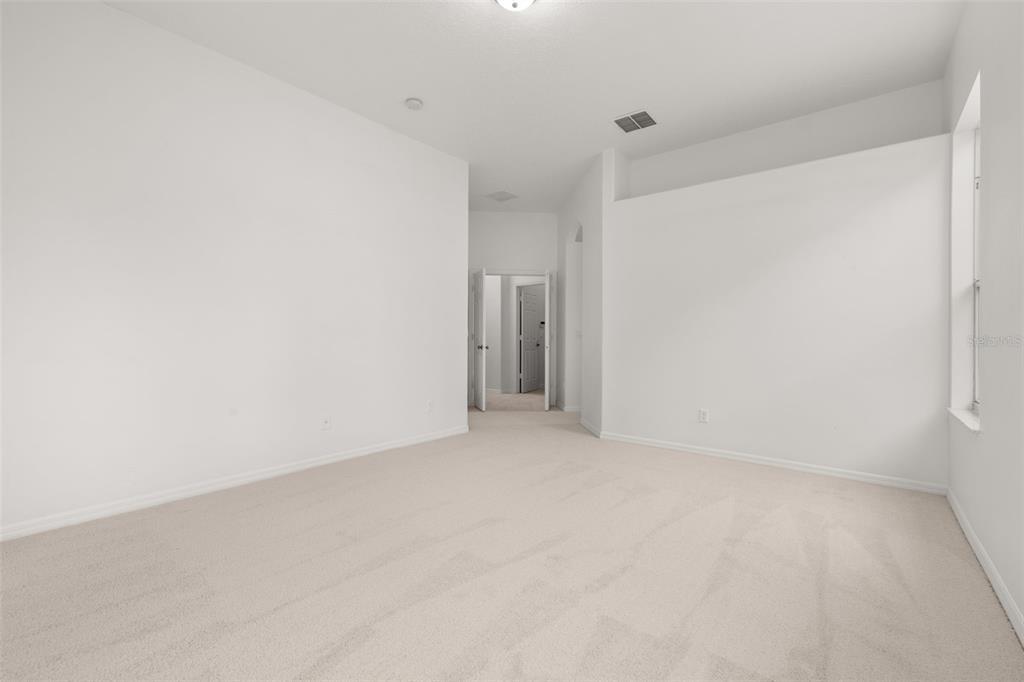 2172 The Oaks Boulevard Kissimmee, FL 34746 - Photo 36 of 81 a view of an empty room