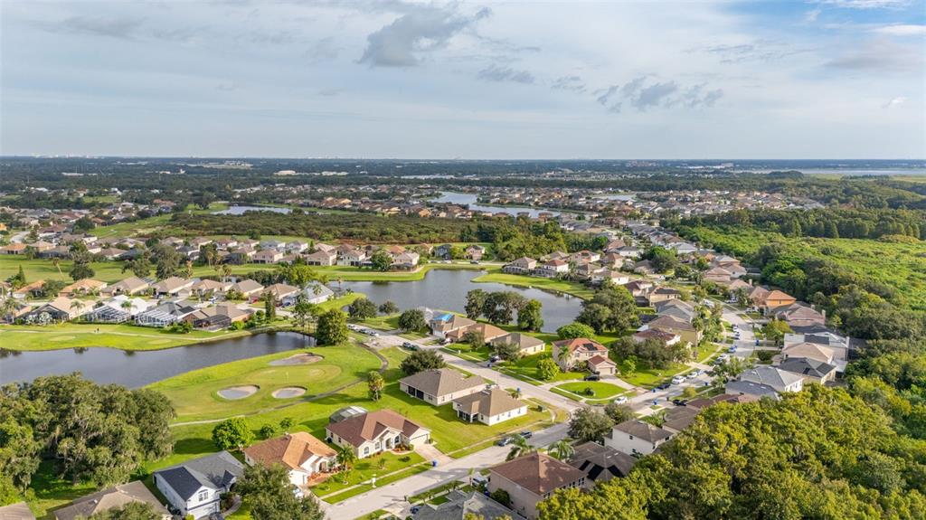 2172 The Oaks Boulevard Kissimmee, FL 34746 - Photo 62 of 81 an aerial view of residential building with outdoor space