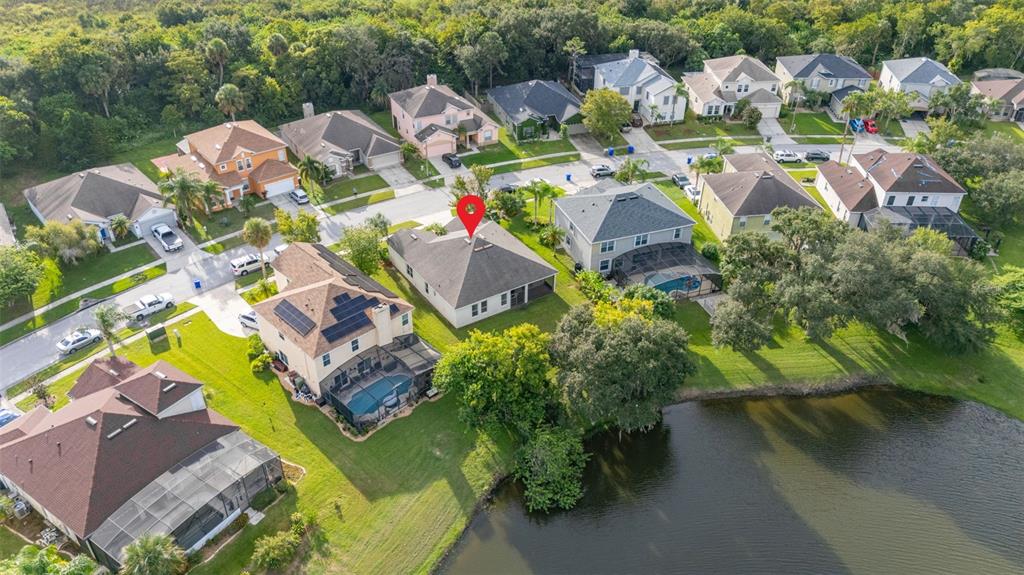 2172 The Oaks Boulevard Kissimmee, FL 34746 - Photo 71 of 81 an aerial view of residential house with outdoor space and swimming pool