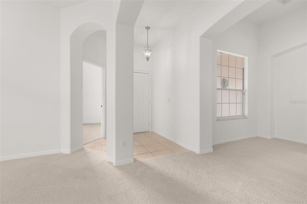 2172 The Oaks Boulevard Kissimmee, FL 34746 - Photo 10 of 81 an empty room with windows