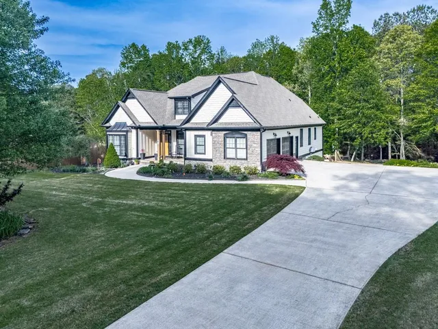 front view of a house with a yard