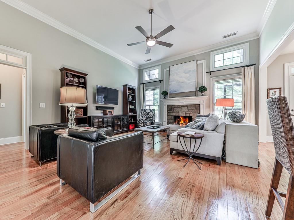 1076 Pinyan Lane Canton, GA 30115 - Photo 15 of 71 a living room with furniture and a fireplace