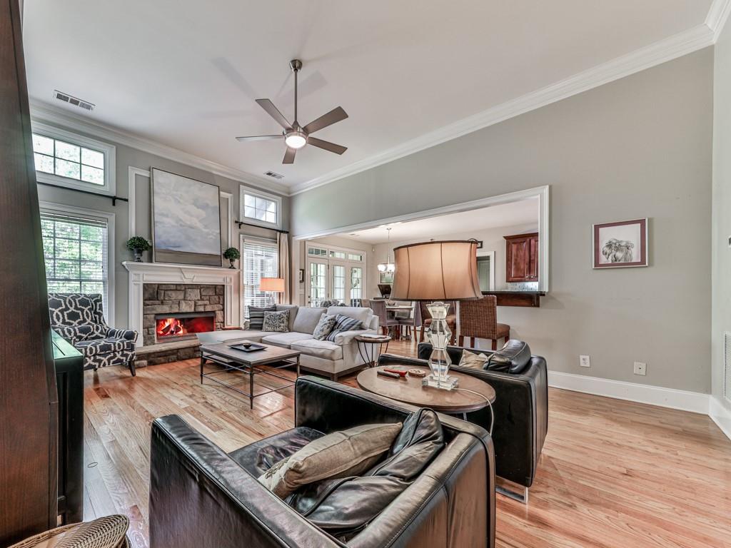 1076 Pinyan Lane Canton, GA 30115 - Photo 16 of 71 a living room with furniture and a fireplace
