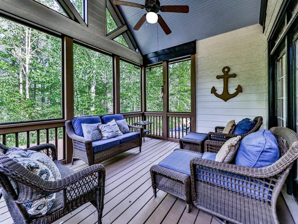 1076 Pinyan Lane Canton, GA 30115 - Photo 25 of 71 a living room with furniture and a large window