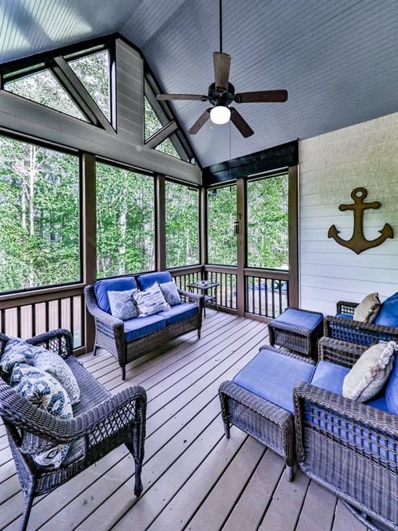 1076 Pinyan Lane Canton, GA 30115 - Photo 26 of 71 a living room with furniture and a floor to ceiling window