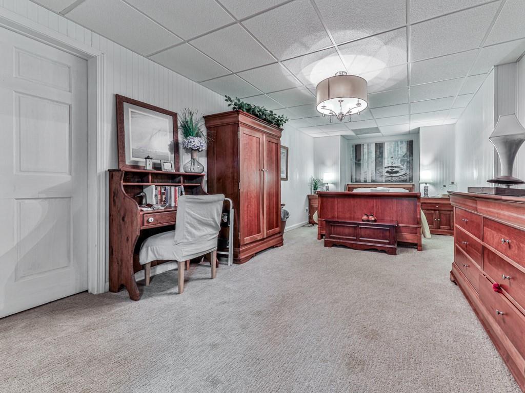 1076 Pinyan Lane Canton, GA 30115 - Photo 47 of 71 a view of living room with furniture and chandelier